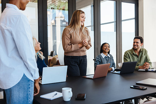 Professional team discussing ideas during a collaborative meeting in a conference room