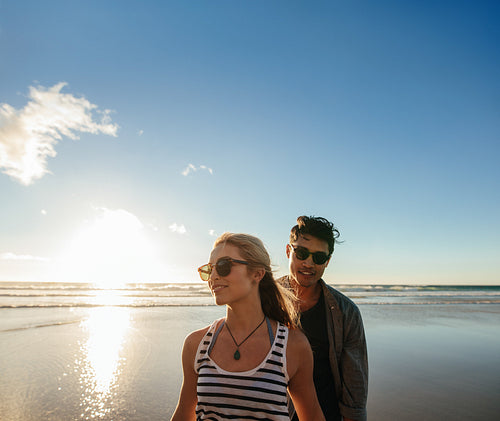 Young couple on the sea shore