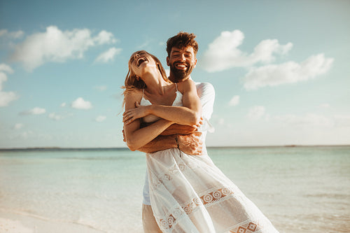 Romantic couple having fun on the beach
