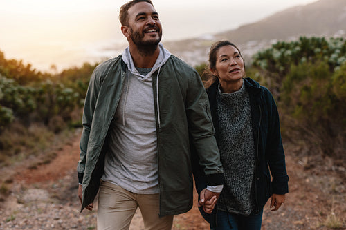 Young man on a hiking trip with his girlfriend
