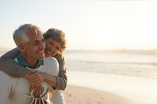 Senior couple having fun at the beach