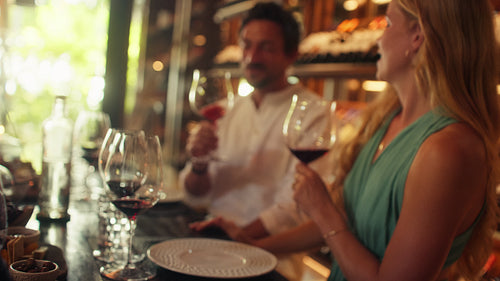 A happy couple enjoys a romantic private wine tasting room experience