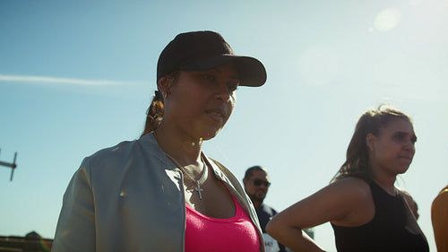 Woman checks fitness tracking device