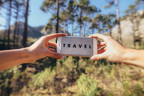 Close up of hands holding smart phone