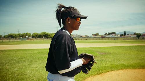Pitcher prepares to throw a baseball on the mound