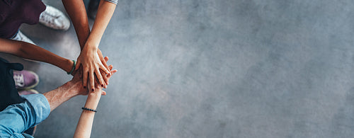 Group of young students showing unity