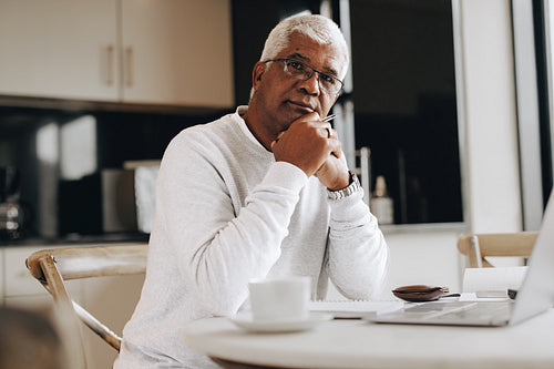 Mature business professional working from home