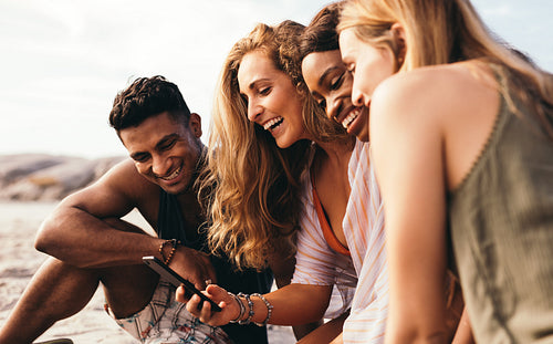 Friends taking selfie at the beach