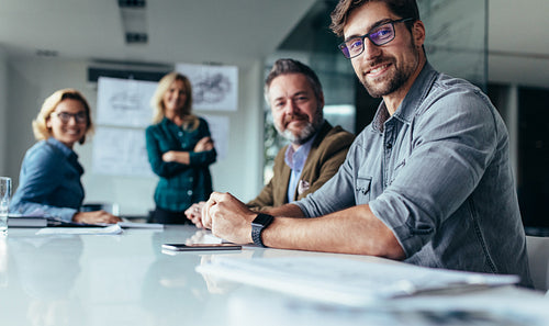Businesspeople sitting in conference room