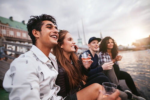 Friends enjoying by the lake