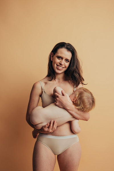 Mother breastfeeding her baby