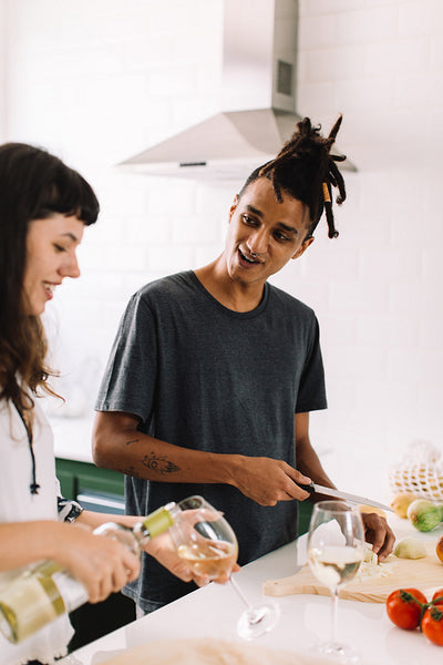 Blissful couple bonding in the kitchen