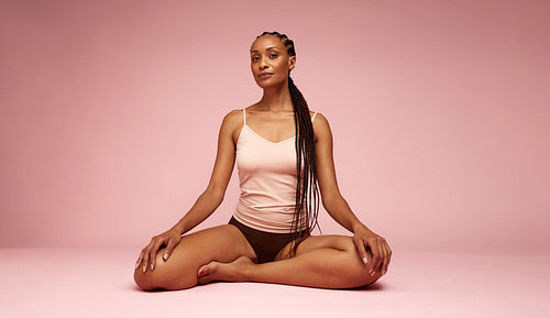 Portrait of mature black woman in underwear