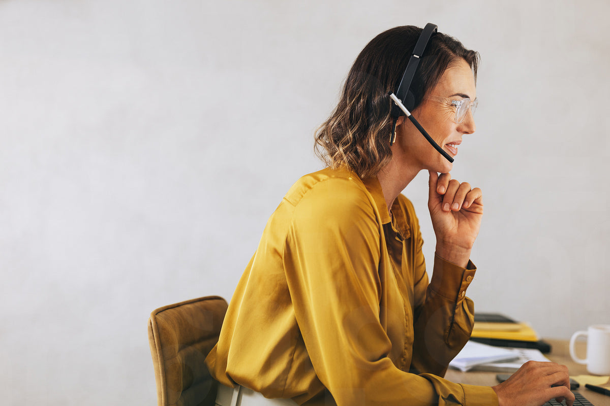 Contact center employee managing call operations with expertise – Jacob ...
