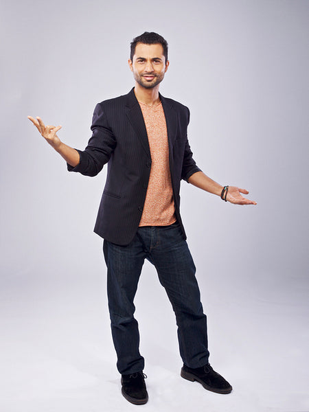 Standing Man Hand Gesturing in a Studio