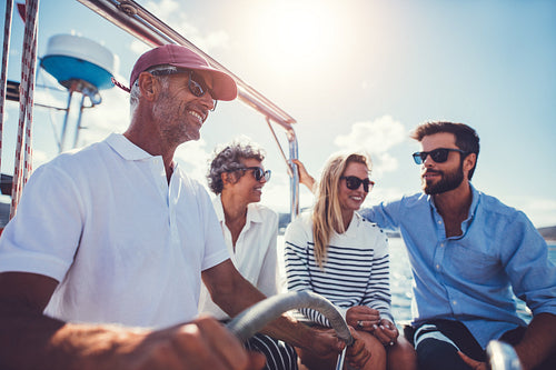 Group of tourists traveling by boat on a summer day