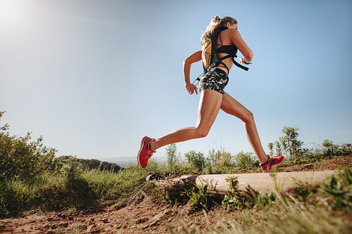 Female runner sprinting outdoors