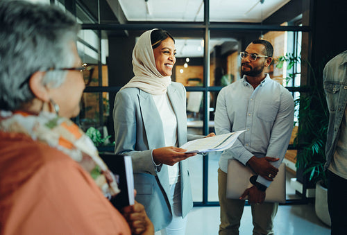Diverse business team holding a meeting in an office