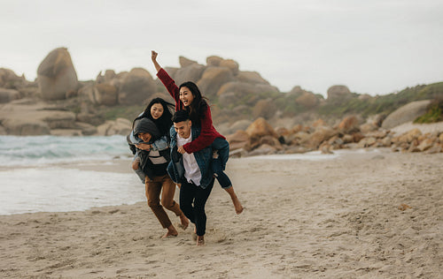Group of friends enjoying themselves at beach