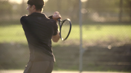 Tennis player in action in slow motion