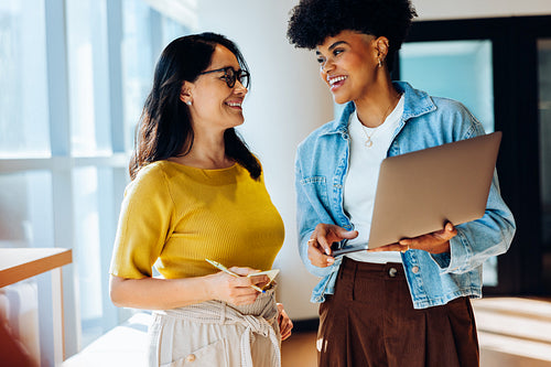 Business planning: Colleagues align on project ideas together
