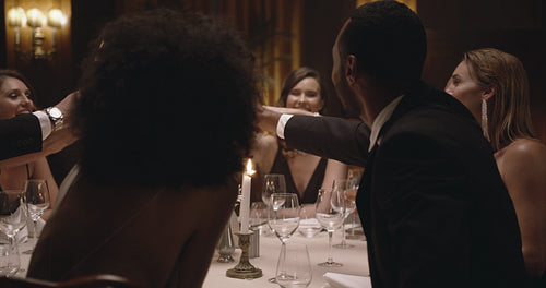 Friends celebrating with drinks at a party