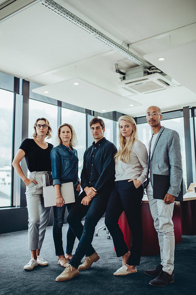 Portrait of a corporate professionals in office boardroom