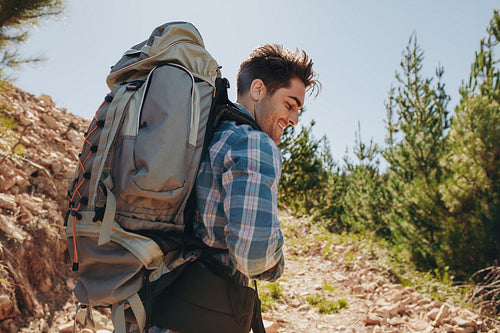 Male hiker trekking on mountain