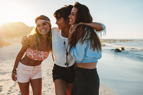Women friends enjoying beach vacation