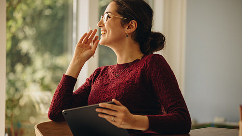 Female graphic designer working at home