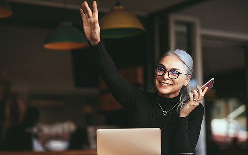 Mature businesswoman at coffee shop