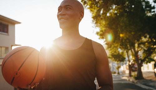 Portrait of man holding a basketball