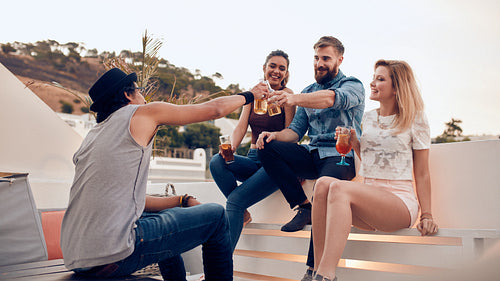 Group of friends enjoying drinks party