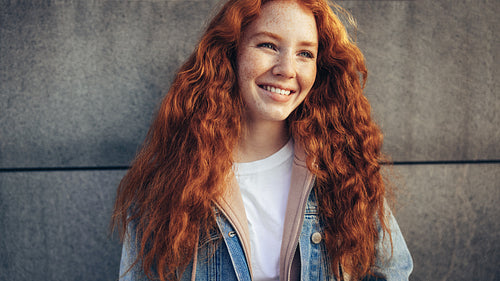 Beautiful young female student outdoors