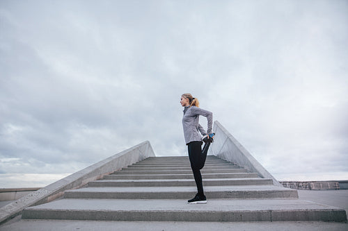 Female exercising in the morning