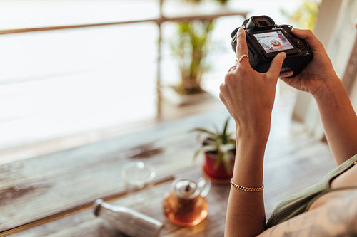Woman taking photos for her food blog