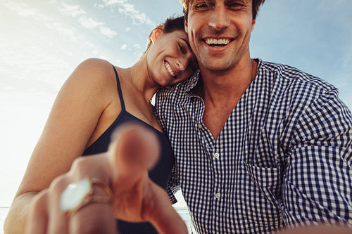 POV of woman touching device screen