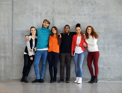 Multiethnic group of happy young university students on campus