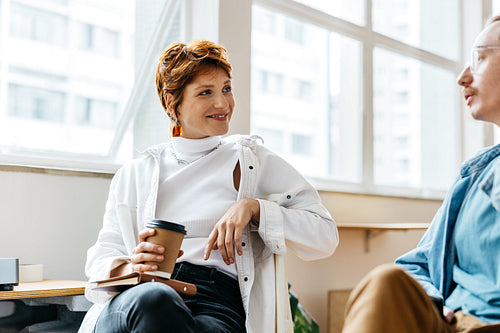 Colleagues collaborating in a bright co-working space