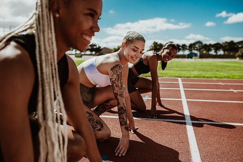 Sprinters ready for race on racetrack