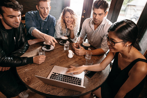 Young people hanging out at a coffee shop