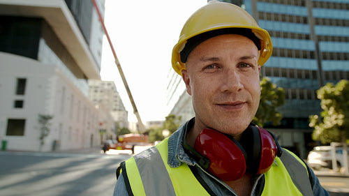 Construction worker smiling at camera