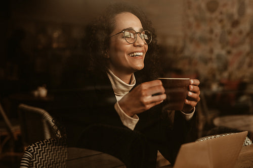 Woman enjoying a cup of coffee