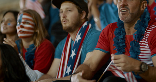 Group of American soccer fans celebrating victory