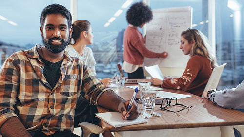 Business coworkers discussing ideas in the board room
