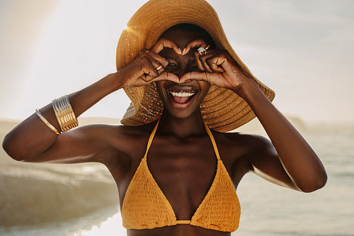 African woman on beach holiday