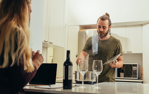 Couple preparing dinner at home