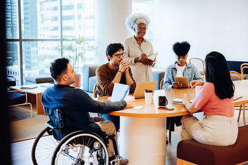 Meeting with diverse team in office