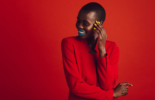 Trendy female model over grey background