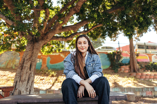 Self-confident teenage girl looking at the camera outdoors